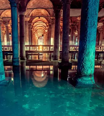a room with columns and water in a building at donat suites apartment in Istanbul