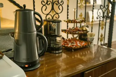 a blender on a counter with a plate of food at Hotel Estambul in Istanbul