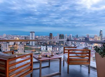 a balcony with a table and chairs and a view at Radisson Blu Hotel Istanbul Asia in Istanbul
