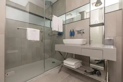 a bathroom with a sink and a shower at Radisson Blu Hotel Istanbul Asia in Istanbul