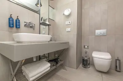 a bathroom with a sink and a toilet at Radisson Blu Hotel Istanbul Asia in Istanbul