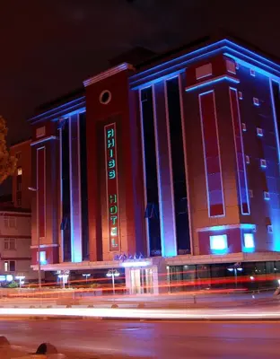 a building with blue and white lights on it at Rhiss Hotel Bostanci in Istanbul