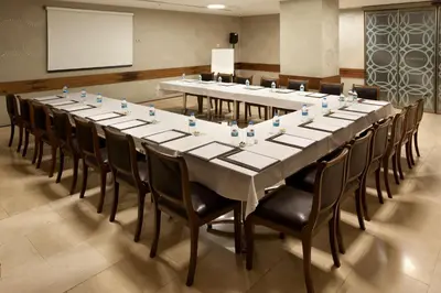 a large conference room with a long table and chairs at Sorriso Hotel in Istanbul