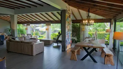 a living room with a couch and a table at Cevizdibi Hotel in Masukiye