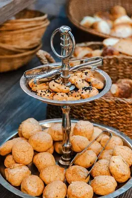 a tray of cookies and other pastries on a table at Cheya Beşiktaş Istanbul Bosphorus City Center Hotel & Suites in Istanbul