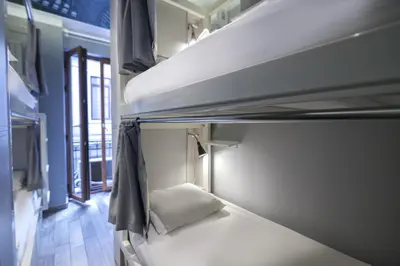a room with two bunk beds in a room at Stay Inn Taksim Hostel in Istanbul