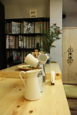 a white hairdryer sitting on top of a wooden table at Stay Inn Taksim Hostel in Istanbul