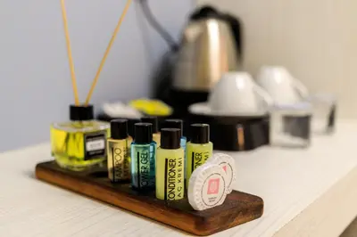 a group of four bottles of hair products on a counter at Nar Palace in Istanbul
