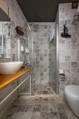 a bathroom with a sink and a toilet and a shower at SuB Karakoy - Special Category in Istanbul