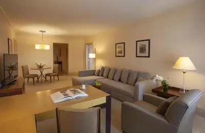 a living room with a couch and a table at Grand Hyatt Istanbul in Istanbul