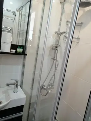 a bathroom with a shower and a sink at Seahouse Suites in Istanbul