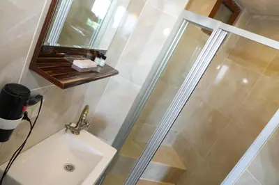 a bathroom with a shower and a sink at Seahouse Suites in Istanbul
