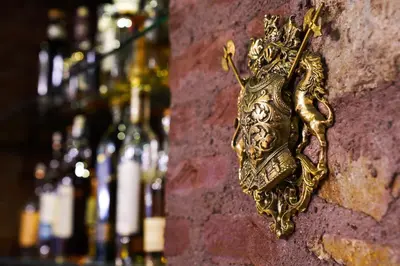 a gold object on the side of a brick wall at Panderma Port Hotel in Bandırma