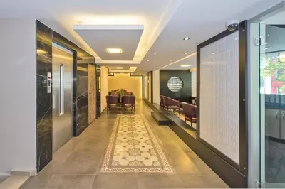 a hallway in a hotel with a rug on the floor at Erbazlar Hotel in Istanbul