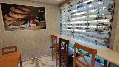 a tasting room with a wall of wine bottles at Hotel Torun Istanbul Old City in Istanbul
