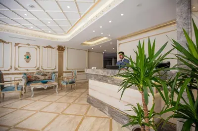 a woman standing at the counter of a salon at Dodo Hotel Spa Old City in Istanbul