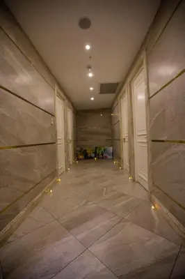 an empty hallway with lights on the floor at Dodo Hotel Spa Old City in Istanbul