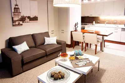 a living room with a couch and a table at 116 Residence in Istanbul