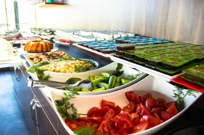 a buffet line with many different types of food at Albatros Hagia Sophia Hotel in Istanbul