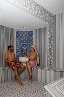 a man and a woman sitting in a bath tub at Premier Vista Hotel in Silivri