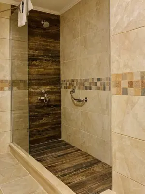 a bathroom with a shower with a sink at Premier Vista Hotel in Silivri