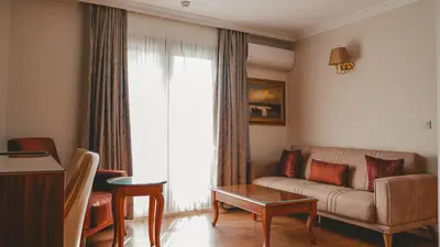 a living room with a couch and a table at Premier Vista Hotel in Silivri