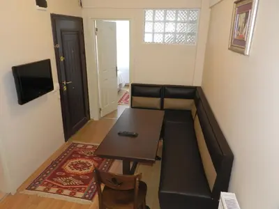 a living room with a couch and a table at Hagia Sophia Apartment in Istanbul