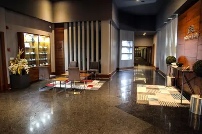 a lobby of a hotel with chairs and tables at Hotel Yayoba in Tekirdag