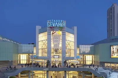 a large glass building with a sign on it at Taxim Express Bosphorus Hotel in Istanbul