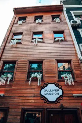 a building with windows and a sign on it at Gulliver Mansion Hotel in Istanbul