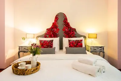 a bedroom with a large bed with towels on it at Ajda Haus Nisantasi in Istanbul
