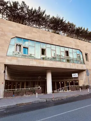 a building with glass windows on the side of it at Ortakoy Aparts in Istanbul