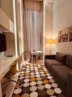 a living room with a couch and a table at Ortakoy Aparts in Istanbul