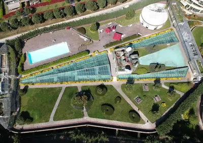 an overhead view of a building with a swimming pool at Ortakoy Aparts in Istanbul