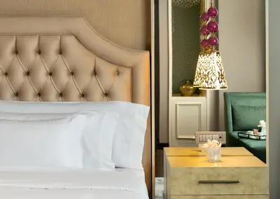 a bedroom with a bed and a nightstand with a bed sidx sidx sidx sidx at Barceló Istanbul in Istanbul
