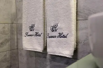 two towels on a towel rack in a bathroom at Ferman Pera Hotel in Istanbul