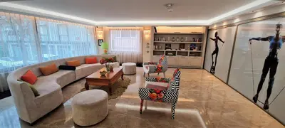 a large living room with a couch and chairs at Tuzla Garden Hotel & Spa in Tuzla