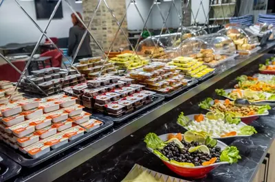 a buffet line with many different types of food at The Queen Hotel in Istanbul