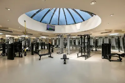 a gym with a bunch of equipment in a building at InterContinental Istanbul by IHG in Istanbul