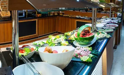 a buffet line with bowls and plates of food at Aprilis Hotel - Special Category in Istanbul