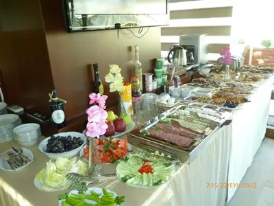 a buffet of food on a table with fruits and vegetables at Dilhayat Kalfa Hotel in Istanbul
