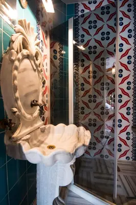 a bathroom with a sink and a mirror at Sultan Corner Hotel in Istanbul