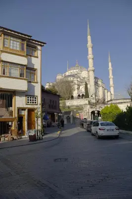 a city street with a mosque in the background at Sultan Corner Hotel in Istanbul