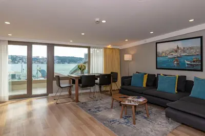 a living room with a couch and a table at Feri Suites in Istanbul