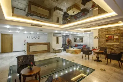 a large room with a living room with a fireplace at P Galata Hotel - Special Category in Istanbul