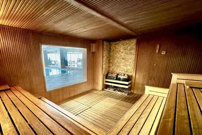 a room with a sauna with a window in it at Ramada by Wyndham Tekirdağ in Tekirdag