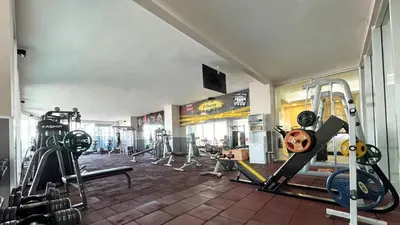 a gym with several tread machines in a room at Ramada by Wyndham Tekirdağ in Tekirdag