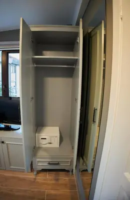 a closet with a desk and a computer in it at Ortakoy Aysem Sultan Hotel in Istanbul