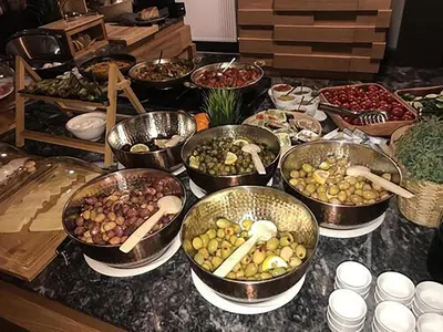 a bunch of bowls of food on a table at B LOFT HOTEL in Bursa