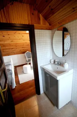 a bathroom with a sink and a mirror at Beyaz Ev Agva - Adult only +15 in Agva